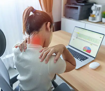 Working woman experiencing head and neck pain
